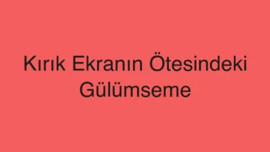 Kırık Ekranın Ötesindeki Gülümseme