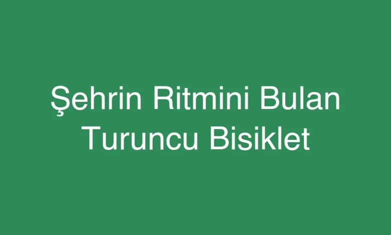 Şehrin Ritmini Bulan Turuncu Bisiklet